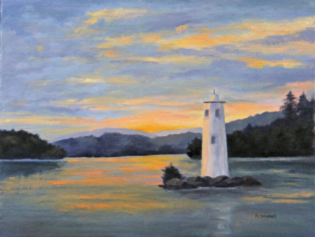Loon lighthouse on Lake Sunapee at sunset